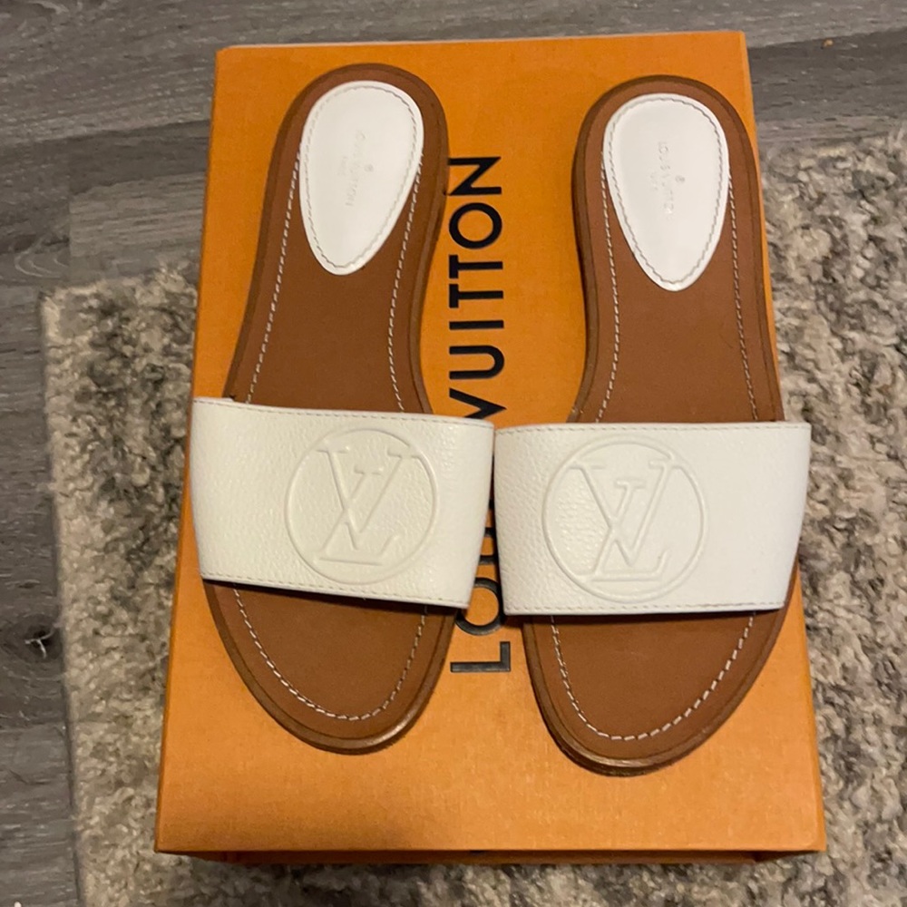 White Louis Vuitton Slides. Size 39 , worn once.
